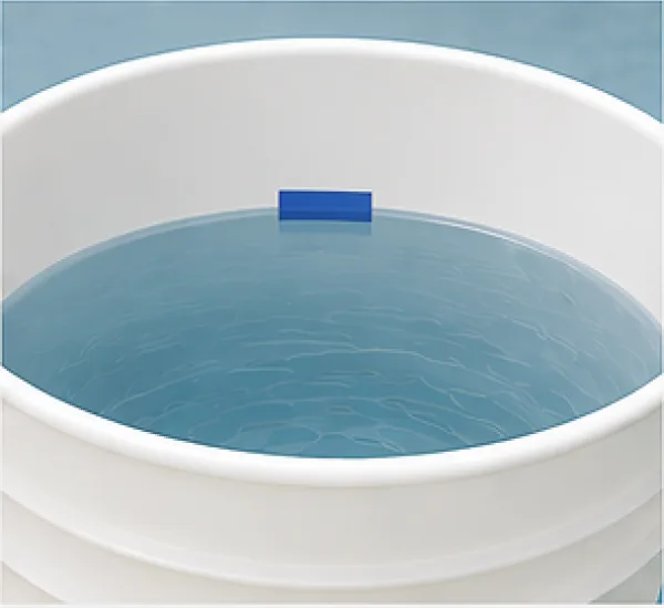 Bucket with tape marking the water level