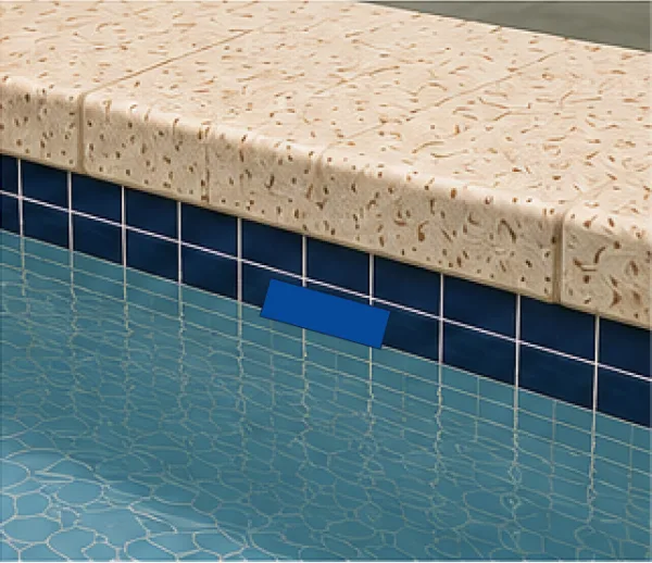 Pool tile with a blue tape marker showing water level